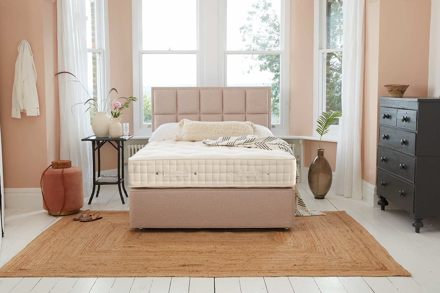 A hypnos bed with an ortho 8 mattress